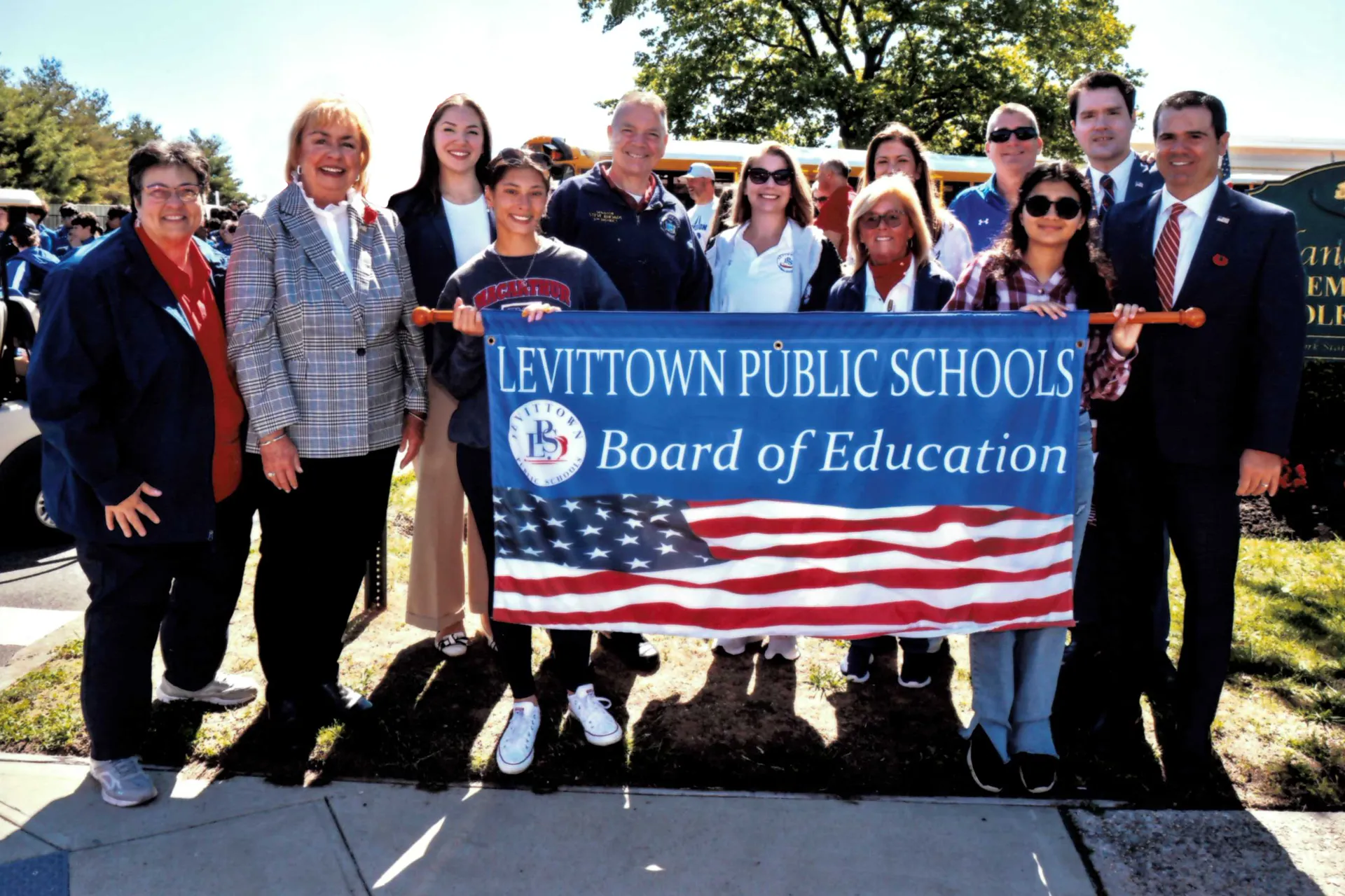 Board of Education Members pose for a photo during the Memorial Day Parade Board of Education Members pose for a photo during the Memorial Day Parade