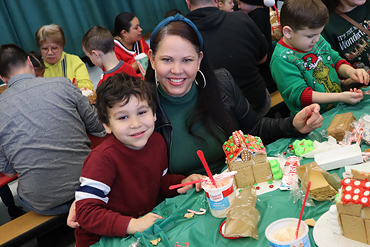 Parents and kindergartners gathered at Gardiners Avenue Elementary School to build gingerbread houses on Dec. 15.