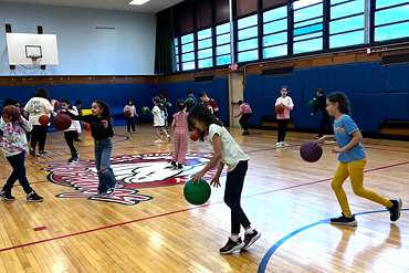 Mrs. McGann's Physical Education Students Work On Their Basketball Skills This Month - image001