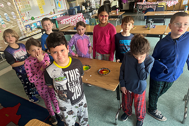 Ms. Coppola's 2nd-grade class created a Skittles Rainbow during a fun-filled STEAM project.