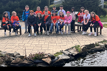 Mrs. Liontonia and Mrs. Maguire's third-grade class took a trip to the Outdoor Learning Center! Students learned about how the pH of the soil affects hydrangea coloring.