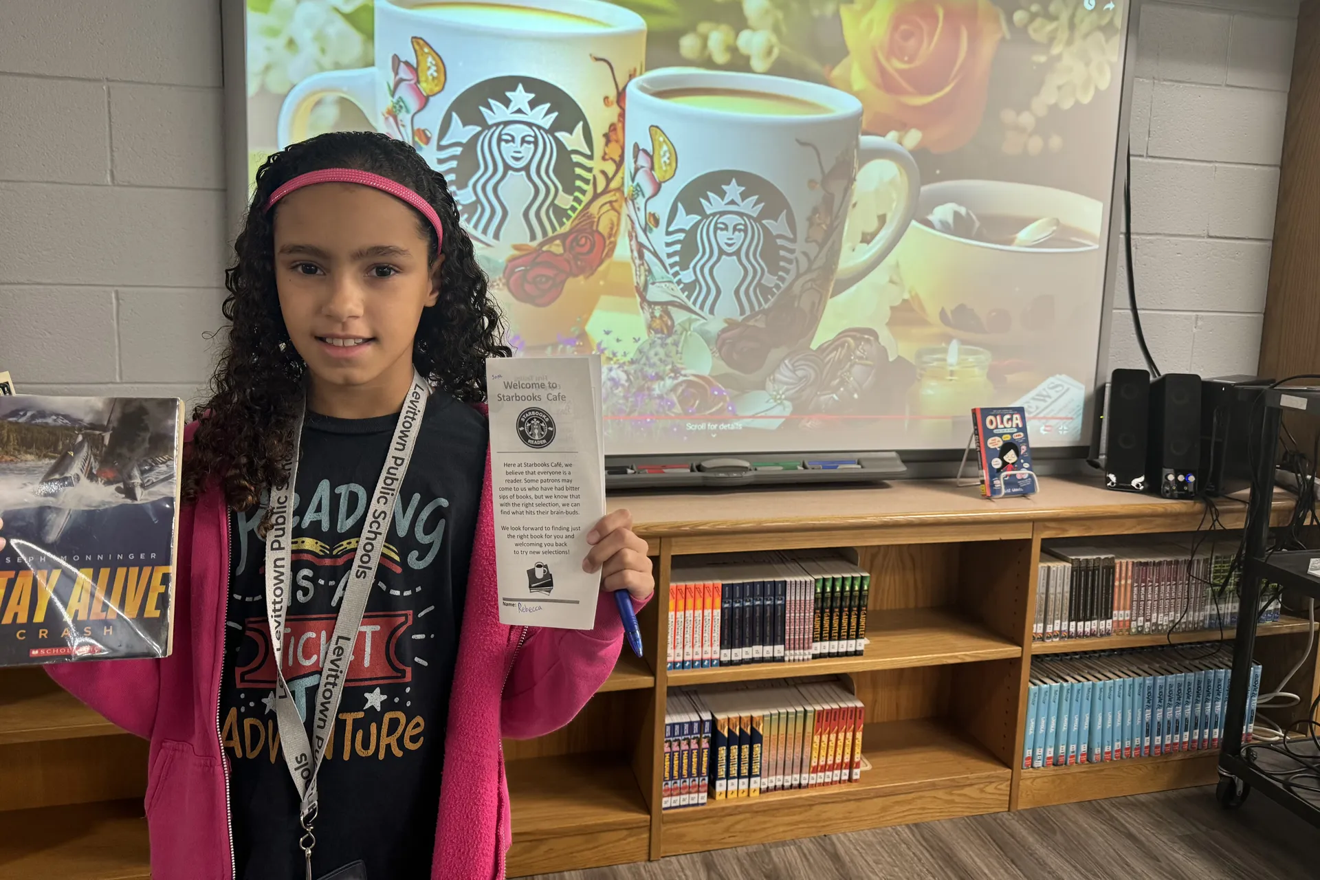 Wisdom Lane Middle School student Rebecca Tyart found her next read in the library's StarBooks Cafe.