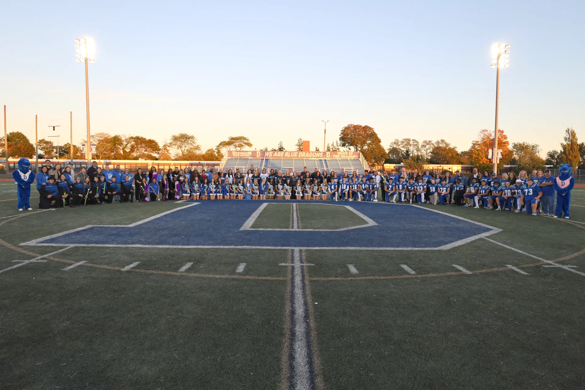 In a massive display, seniors on the marching band, cheer and football teams gathered with their parents on the field. In a massive display, seniors on the marching band, cheer and football teams gathered with their parents on the field.