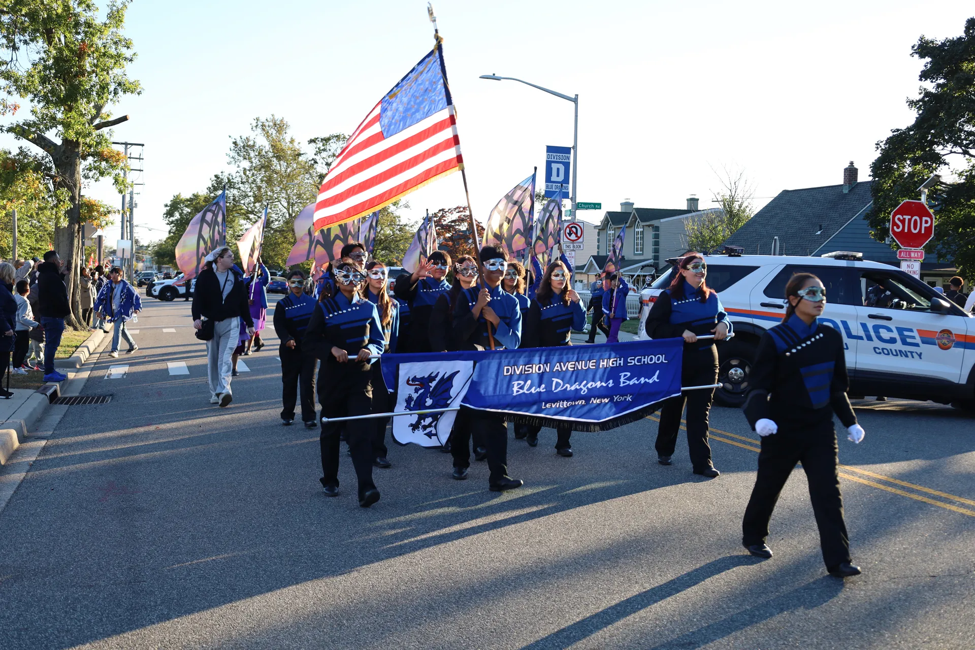 The Blue Dragons marching band led the parade. The Blue Dragons marching band led the parade.