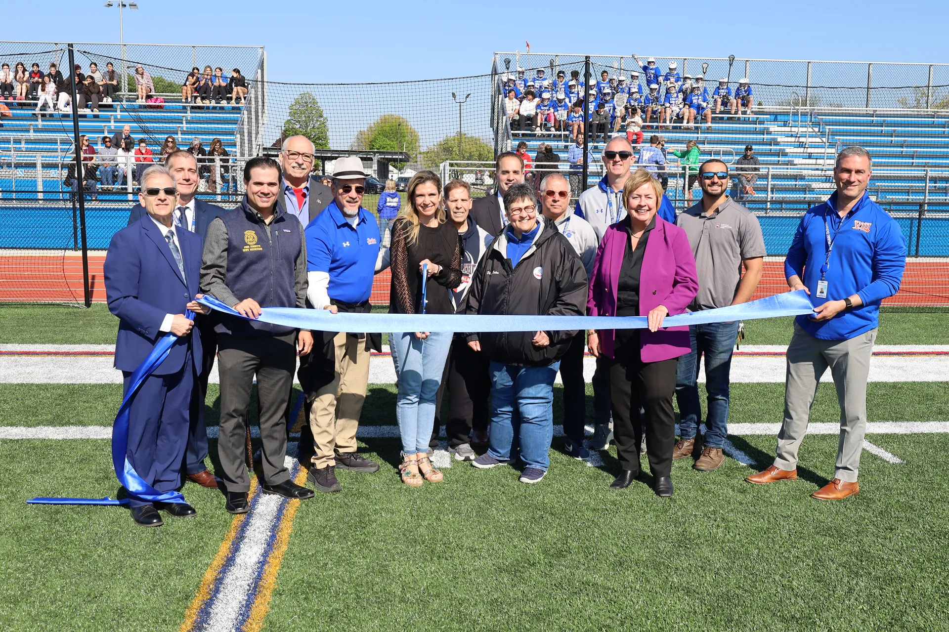 Levittown School District trustees and administrators along with local government officials cut the ribbon on the Wisdom Lane Middle School track and field on May 1.